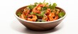 A bowl filled with fresh shrimp and leafy greens, perfect for a healthy and delicious seafood salad