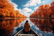© Michael Böhm - Woman enjoying a peaceful boat ride on a calm lake