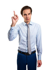 Poster - A man in business attire pointing upwards, isolated on a white background, signifying a concept or idea