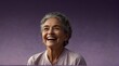 young mexican elderly woman on plain bright purple background laughing hysterically looking at camera background banner template ad marketing concept from Generative AI