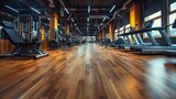 Fototapeta  - Modern Gym Interior with Fitness Equipment. Empty modern gym interior equipped with various fitness machines ready for training.