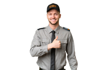 Sticker - Young security caucasian man over isolated background giving a thumbs up gesture