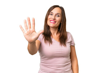 Wall Mural - Middle-aged caucasian woman over isolated background counting five with fingers