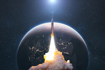 Aufkleber - Space rocket lift off into cosmos with smoke and blast on a background of the blue planet earth. Spacecraft flies in space with a starry sky near the planet. Successful start of the mission