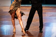 a couple dance a Latin dance. the legs of a dancing couple
