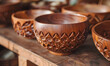 Handcrafted wooden bowls with intricate carving showcasing artisan craftsmanship, Generative AI 