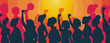 Silhouetted individuals stand united with raised fists as a symbol of solidarity and strength against a backdrop of a fiery sunset