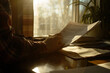 clean photo of a person reviewing social security documents with meticulous care under soft, diffused light, highlighting the importance of thoroughness and diligence in administra