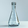 Glass bottle with droplet of water in it, science, transparent, single object, laboratory