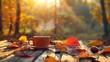 Rustic wooden table adorned with colorful autumn leaves and a steaming cup of coffee in the morning sunlight.