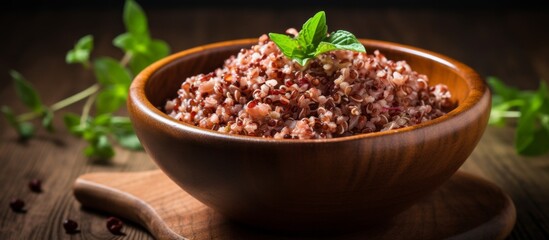 Poster - A wooden bowl filled with rice, a staple ingredient in many cuisines, sits on a wooden table, ready to be mixed with fines herbes and other vegetables for a delicious dish