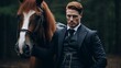 A handsome Confident Red-haired Man wearing a Stylish Fashionable Suit, Tuxedo stands next to a brown horse and looks at the camera at the ranch.