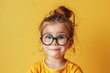 child girl wears eyeglasses color background
