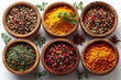 Spices and herbs in wooden bowls - Delving into the Richness of Culinary Tradition with a Collection of Spices and Herbs Nestled within Polished Wooden Bowls