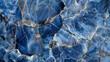 A detailed view of a rich sapphire blue and white patterned natural marble background, highlighting the unique and complex natural patterns and textures, giving off a serene and majestic oceanic vibe.