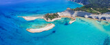 Fototapeta  - Ionian islands of Greece Corfu. Panoramic aerial view of stunning Cape Drastis - natural beuty landscape with white rocks and turquoise waters, north of the island