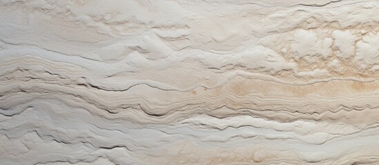 Poster - A closeup photo of a beige marble countertop with a swirling pattern, resembling a landscape painting. The rectangle shape is perfect for flooring or as a wood accent in an event space