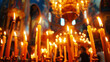 © Edgar Martirosyan - Background orange candles easter burn in orthodox temples.