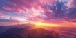 The sun lowers behind a colorful mountain range in a Natural colorful panoramic landscape 