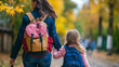 © Aaron Weiss - Mother picks up child from school. Learning and school concept.