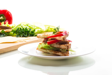 Wall Mural - fried toast with chicken, salad, greens isolated on white background