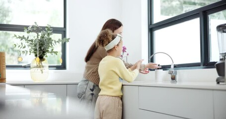 Canvas Print - Teaching, kitchen and mom with kid to wash hands for hygiene, health or wellness at home. Soap, water and girl child learning to clean skin with mother to prevent germs, bacteria or dirt at house.