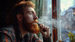 Bearded Man Enjoying Pipe Smoke by Window View

