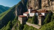 A photo of a monastery on a mountainside.

