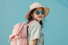 Happy Young Asian Female Tourists Wear Beach Hats, Sunglasses And Backpacks On Holiday Trips.