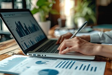 Poster - Financial analysts analyzing market trends and data on a laptop, Analyzing market trends and data on a laptop, financial analysts work diligently.