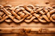 A close-up of a natural pine desk with an abstract wood knot pattern, providing a rustic space for text.