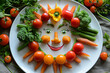 © kornc - A plate of vegetables is arranged to look like a smiling face