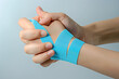 Instructional Demonstration of Applying Kinesiology Therapeutic Tape on Wrist