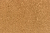 Fototapeta  - Brown sand color rough wall plaster solid surface texture background stucco backdrop pattern