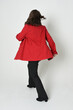 full length portrait of beautiful brunette woman model, wearing red trench coat jacket leather pants. standing pose in backview, walking away the camera. isolated silhouette on white studio background