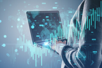 Wall Mural - Headless hacker hands using laptop with growing blue forex chart and map hologram on blurry background. Banking, hacking, malware, invest and financial growth concept. Side view.