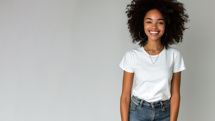 Wall Mural - Afro woman wear white t-shirt smile isolated on grey background