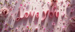 A pink background with flowers and the word LOVE written in pink, concept of love and affection