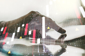 Poster - Multi exposure of abstract creative financial graph with world map and finger presses on a digital tablet on background, forex and investment concept
