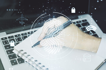Aufkleber - Double exposure of abstract creative fingerprint hologram with hand writing in notebook on background with laptop, research and development concept