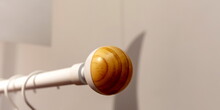 Wooden End Of The Clothes Rack Close-up
