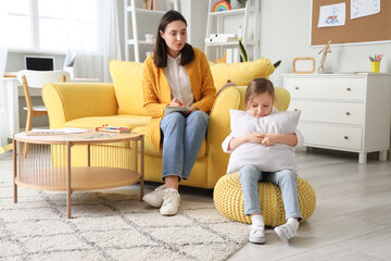 Canvas Print - Upset little girl with pillow at psychologist's office