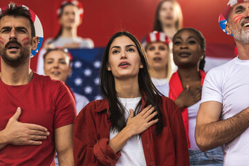 American football / soccer fans singing anthem at the stadium