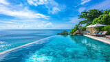 Fototapeta  - A tranquil infinity pool overlooking the ocean with sun loungers and palm trees against a clear sky..