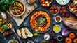 Top view of various fresh Mediterranean dishes on a table - Vibrant top shot of an array of Mediterranean dishes with hummus, salad, bread, and dips on a dark surface