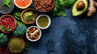 Healthy food clean eating selection: fruit, vegetable, seeds, superfood, cereals, leaf vegetable on gray  copy space
