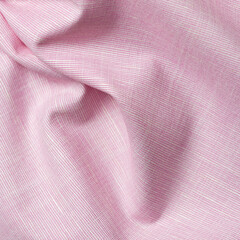 Fabric texture background close-up. Pink color fabric texture.