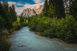 Boite river and high mountains at sunset, Dolomites, Italy