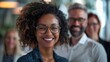 © Katsiaryna - Portrait of beautiful african american woman smiling at camera in cafe