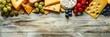 many different types of cheese on a textured background